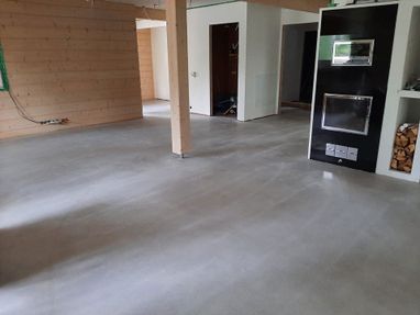 Takkahuoneen betonilattian hionta ja pinnoitus